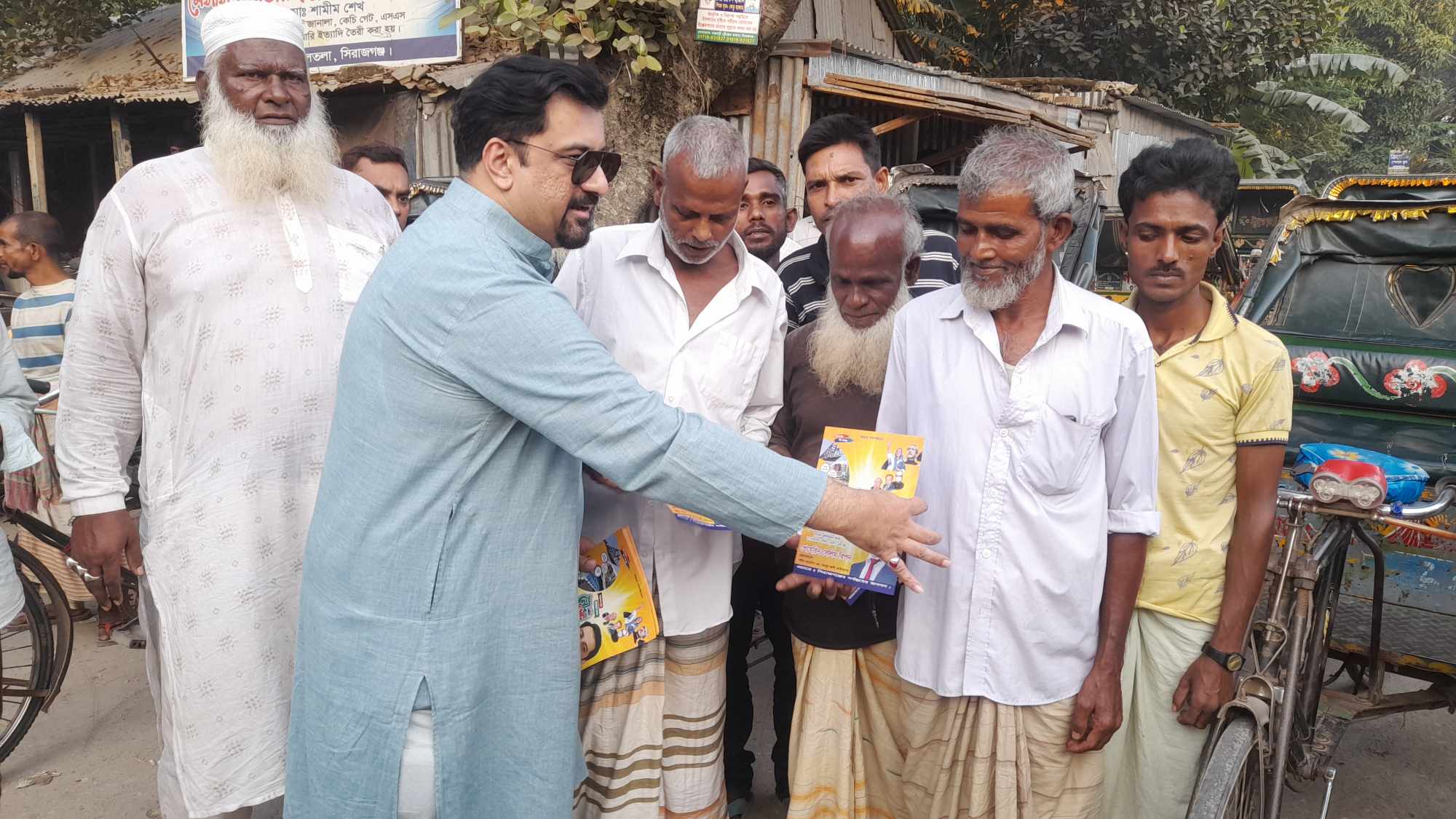 নৌকার পক্ষে উন্নয়ন প্রচারণা সিরাজগঞ্জে শেহেরিন সেলিম রিপনের