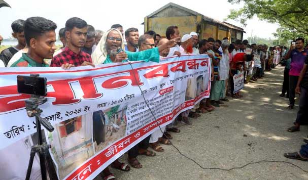 বড়পুকুরিয়া কয়লাখনি এলাকার ১০ হাজার ঘরবাড়ীর ক্ষতিপূরণের দাবিতে মানববন্ধন  ১৫ দিনের মধ্যে ক্ষতিপূরণ না পেলে কয়লাখনি ঘেরাও কর্মসূচি ঘোষণা